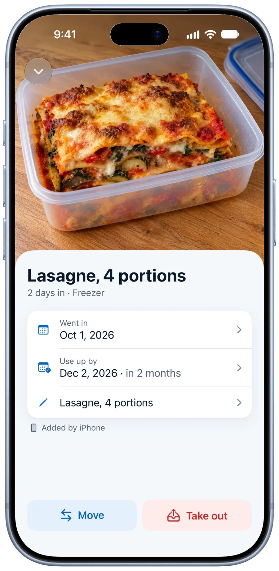 A lasagne up close with its photo, freezing date and use-up date